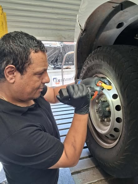 Mark from Autova inspecting a vehicle on a Perth driveway